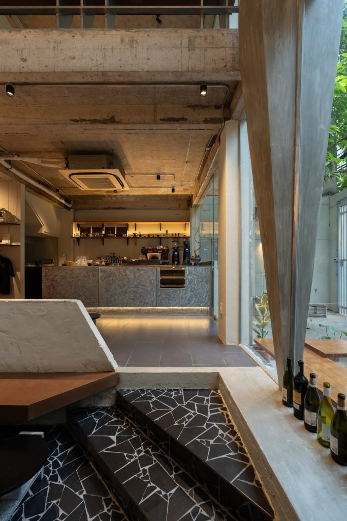 Day1 Cafe by oh.hi studio, interior seen from the stepped seating by the void