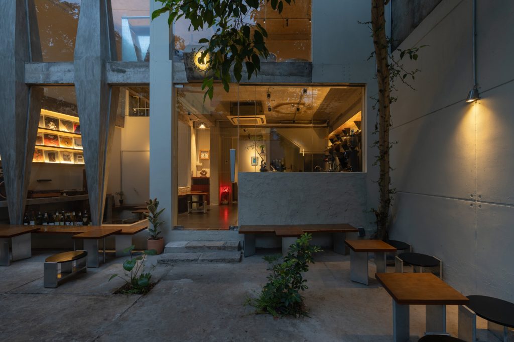 Day1 Cafe by oh.hi studio, courtyard seating looking into the café