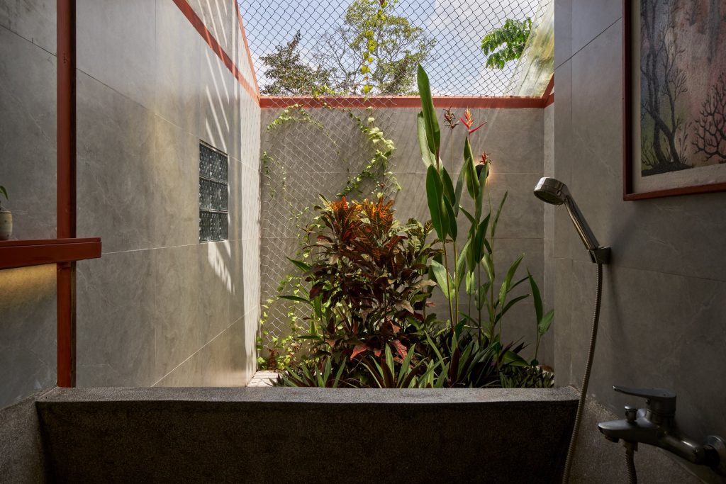 Garden House by aha.studio.arc, Go Quao, An Giang, garden inside the bathroom block