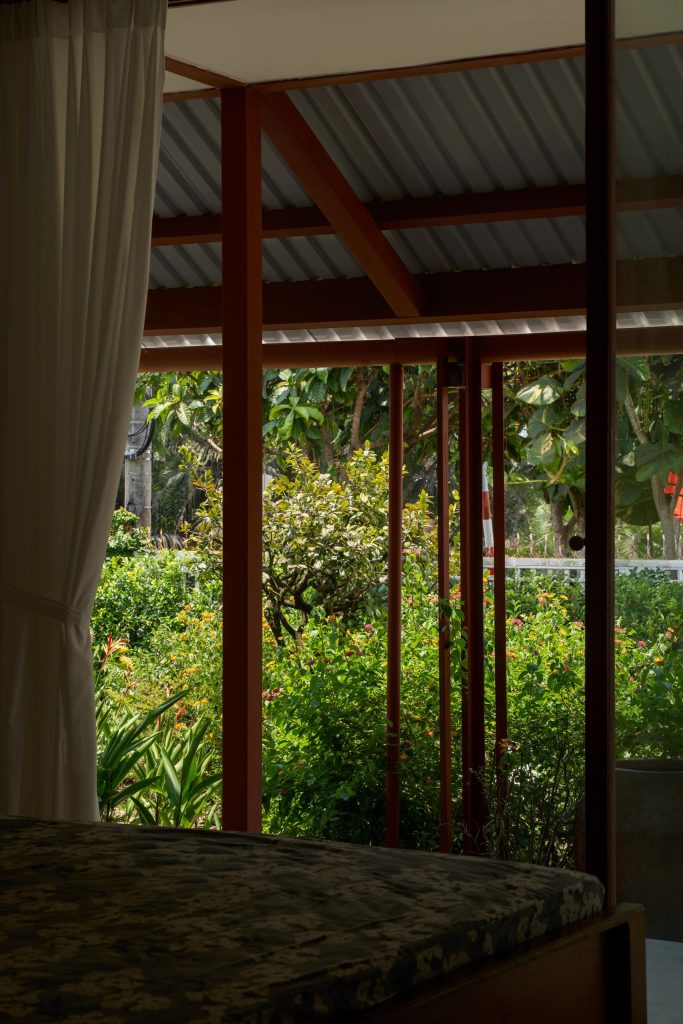 Garden House by aha.studio.arc, Go Quao, An Giang, bedroom opening to the garden