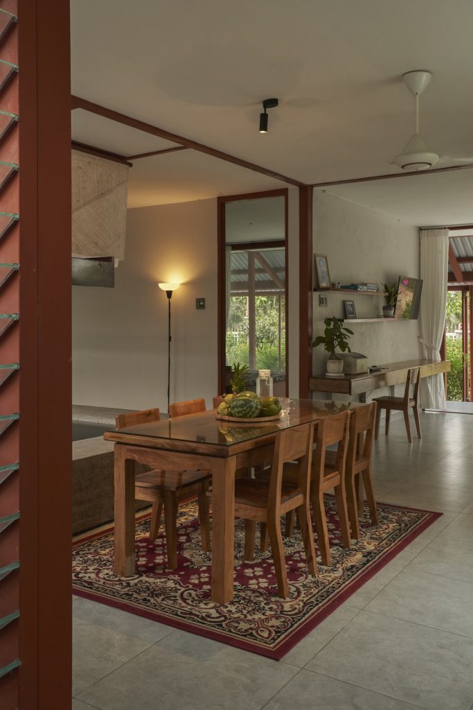 Garden House by aha.studio.arc, Go Quao, An Giang, dining table in the shared space