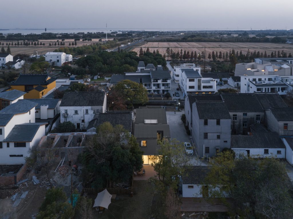 The bookstore among village roofs from the air