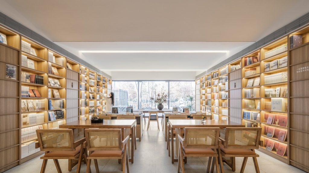 Bookstore tables ringed by shelves