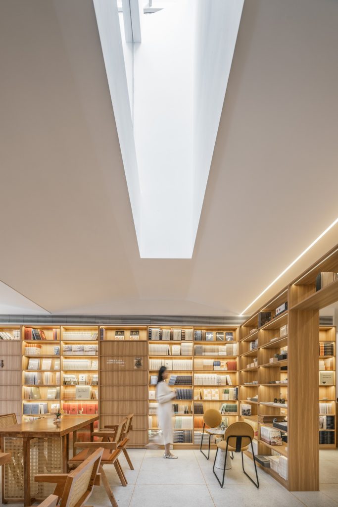 Daylight falling from the light well onto the shelves