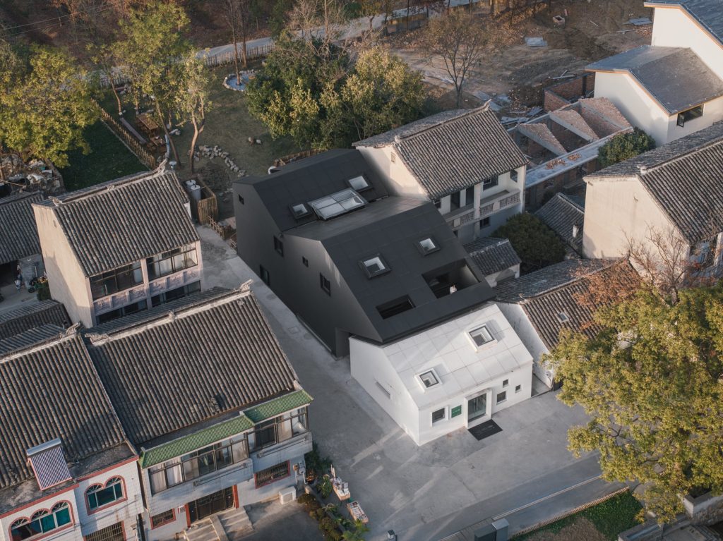 Aerial view of the black and white volumes