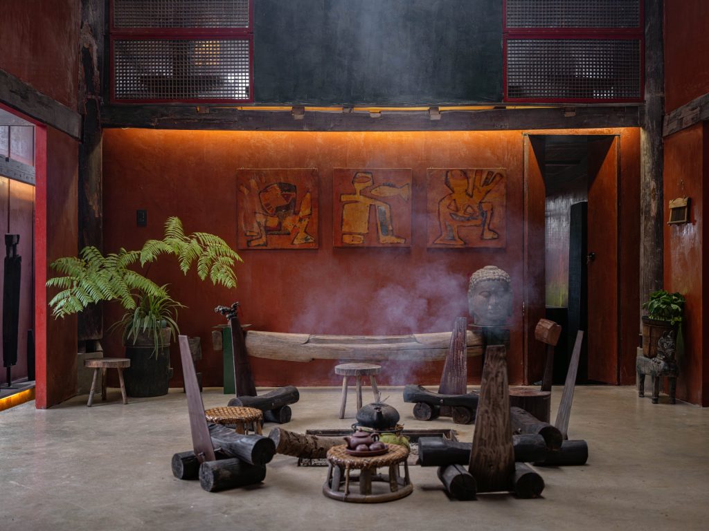 Hearth and living area with carved heritage wood