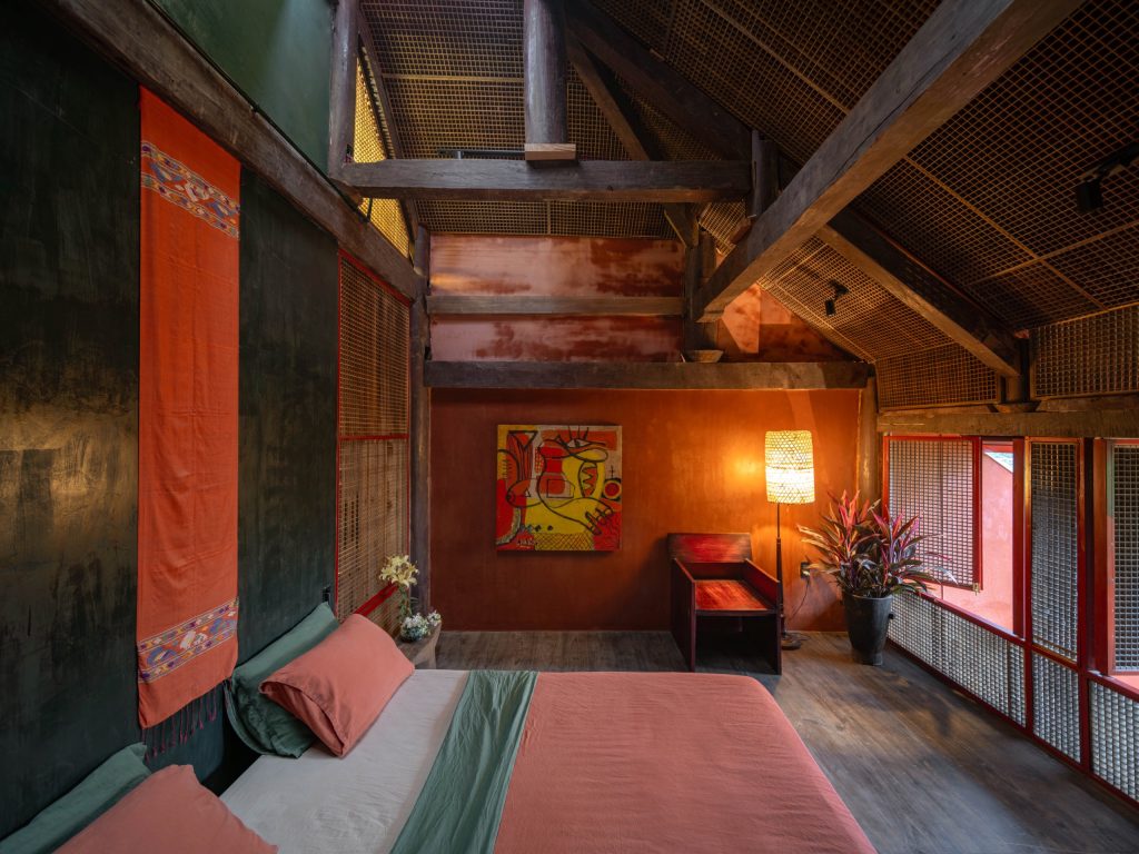 Bedroom under exposed rafters