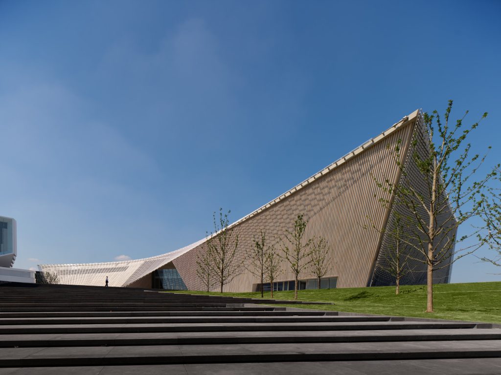 Steps leading up to the sloping ceramic facade