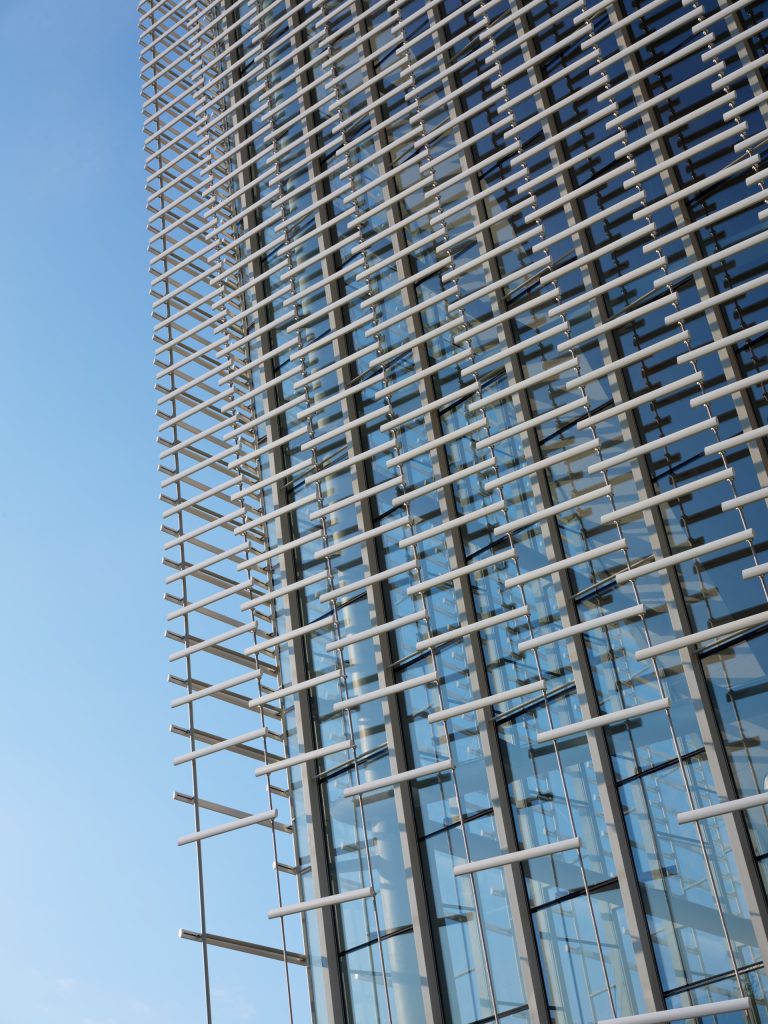 Ceramic screen in front of the glazed facade