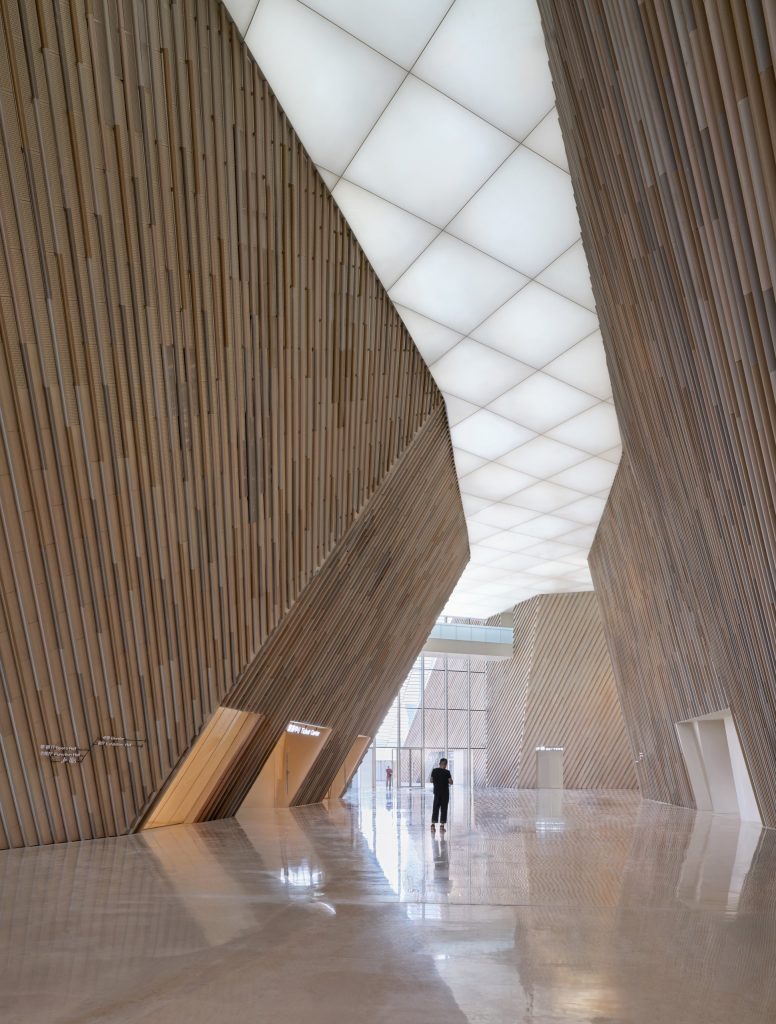 Daylit pedestrian spine between the volumes