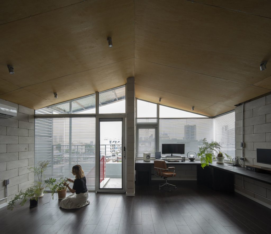 Room Above by scale50, Ho Chi Minh City, workspace under the pitched ceiling
