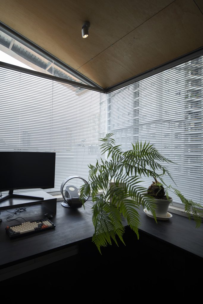 Room Above by scale50, Ho Chi Minh City, desk by the glazed corner