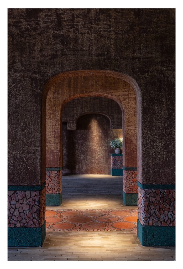 Arched doorway with a figure in the niche