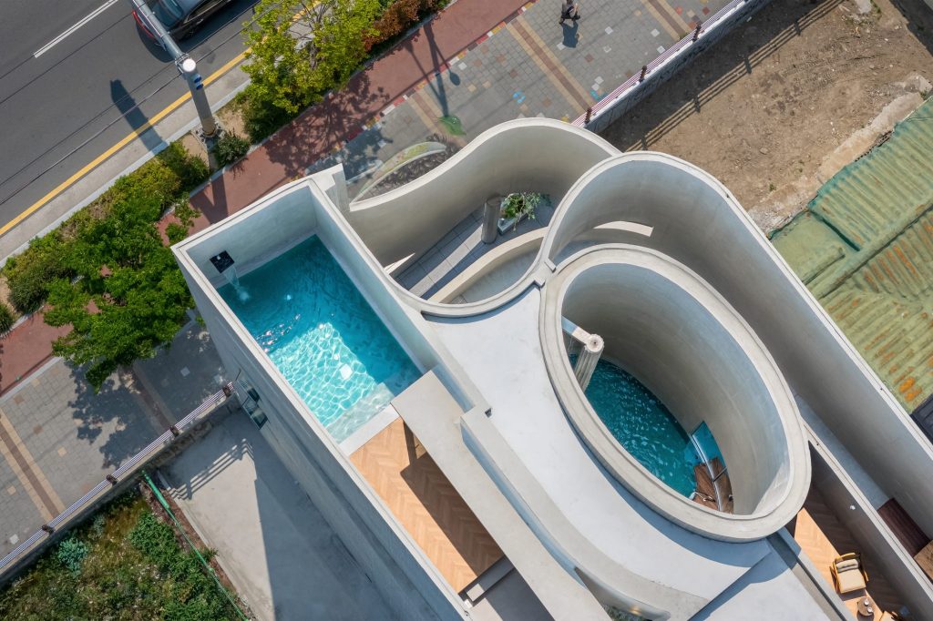 Overhead view of the upper pools and curved walls