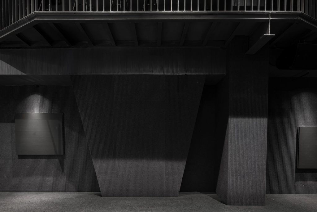 Dark auditorium with inclined walls