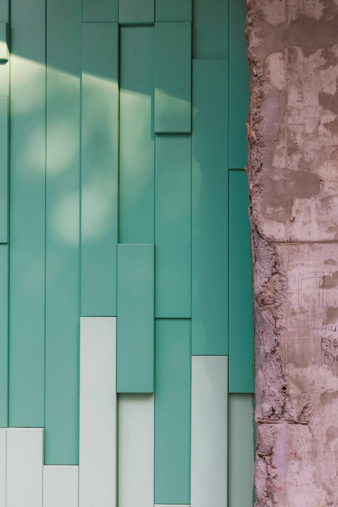 Detail of stacked green aluminium panels