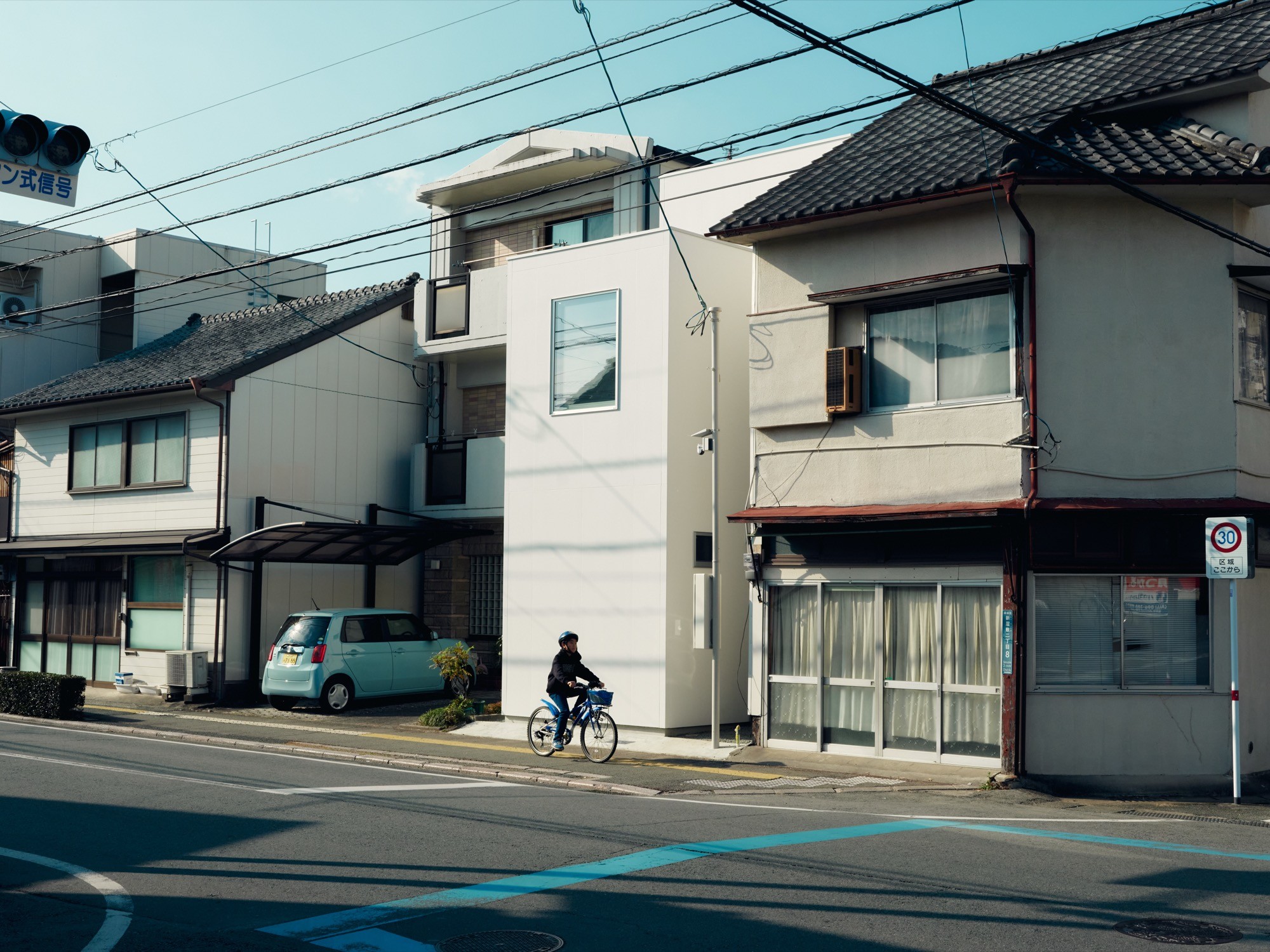 A super ordinary house, reimagined as three timber towers in Japan