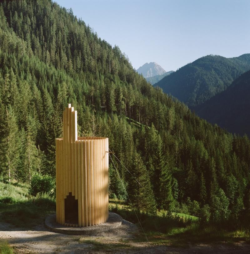 Chapel for all faiths: A timber veil, shifting light and materials drawn from the site
