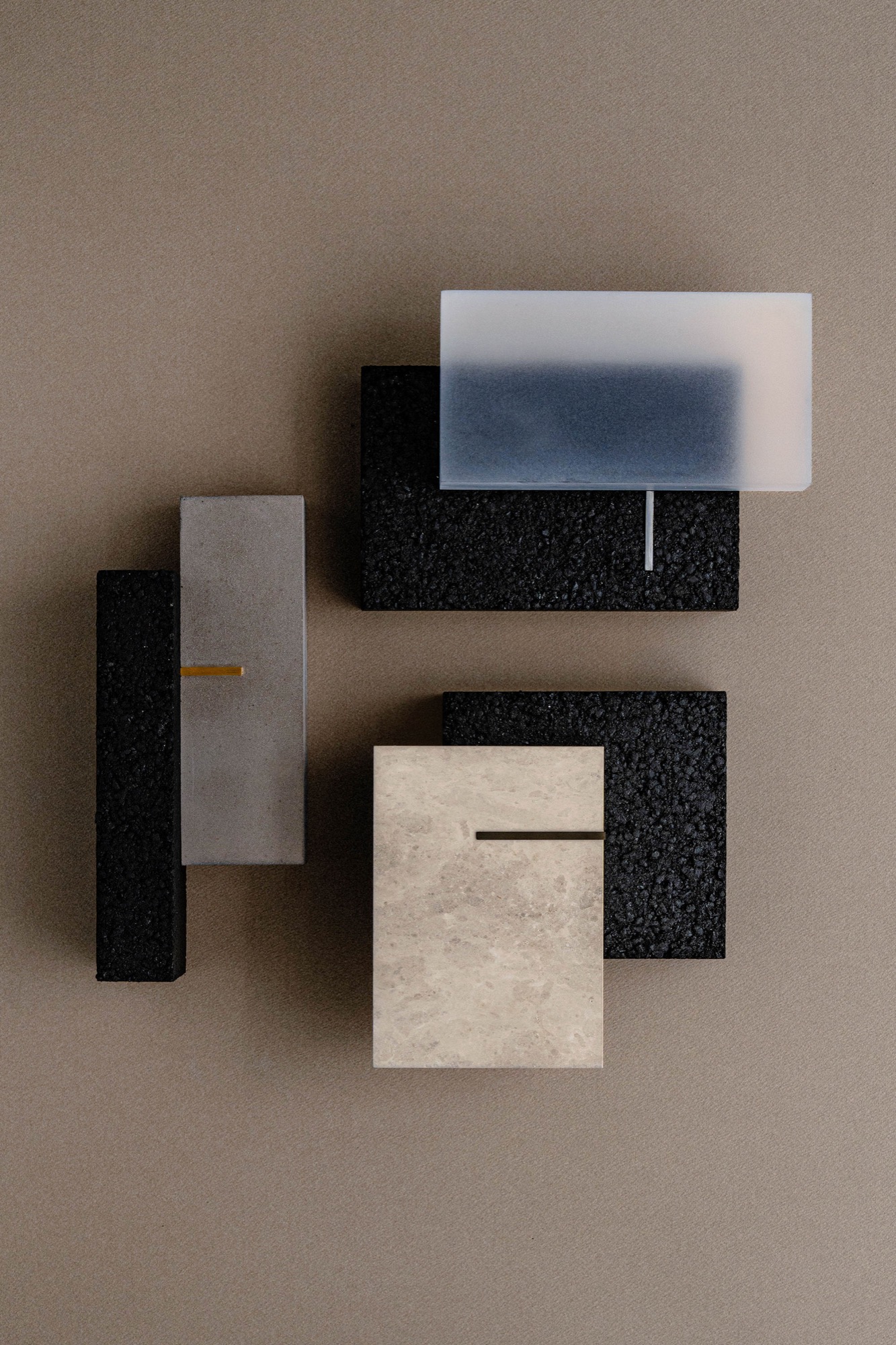 So Koizumi binds metal, stone and resin with asphalt in the As furniture collection