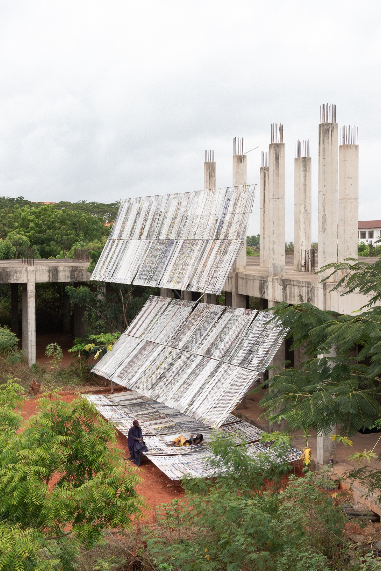 TAELON7 transforms unfinished structure in Accra into Limbo Engawa installation