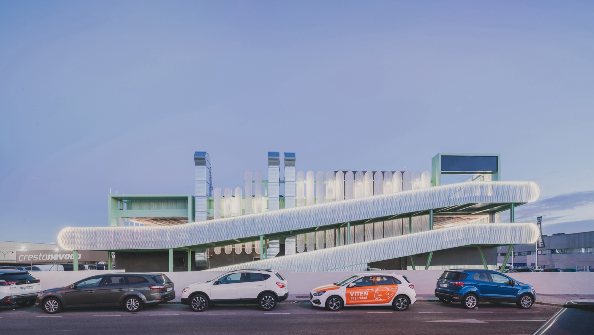 OOIIO wraps Madrid car centre in slatted metal facade