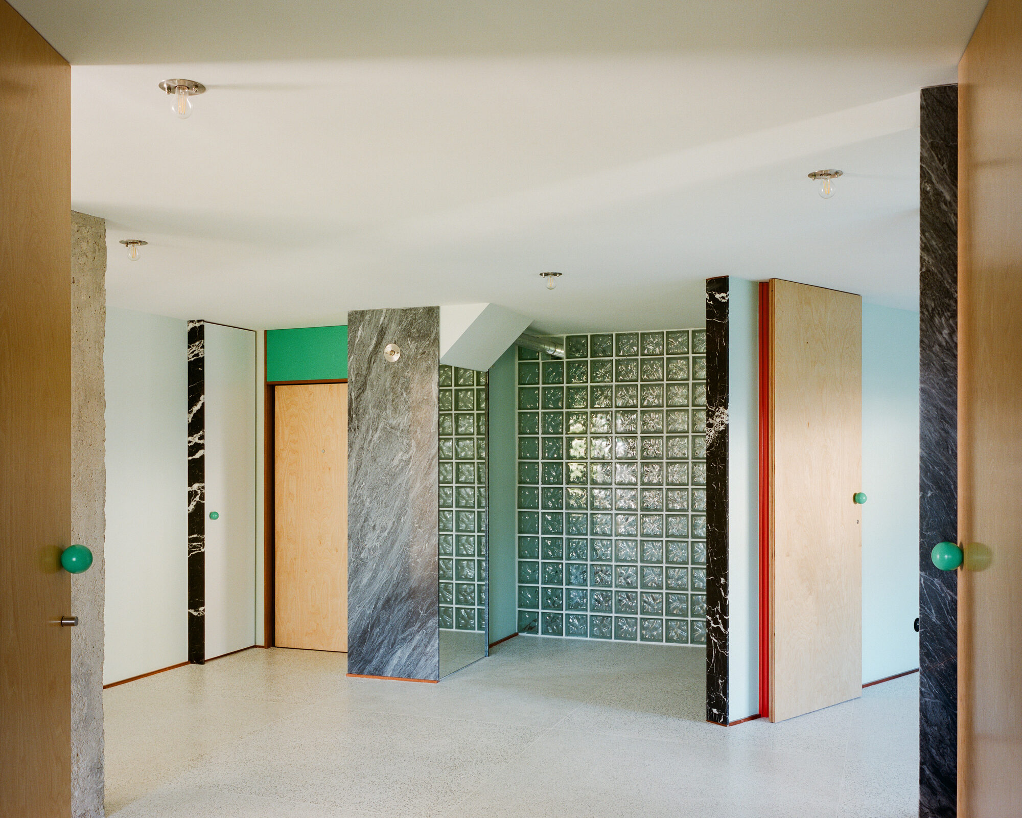 Fala Atelier uses angled walls and colour to reorganise Porto apartment