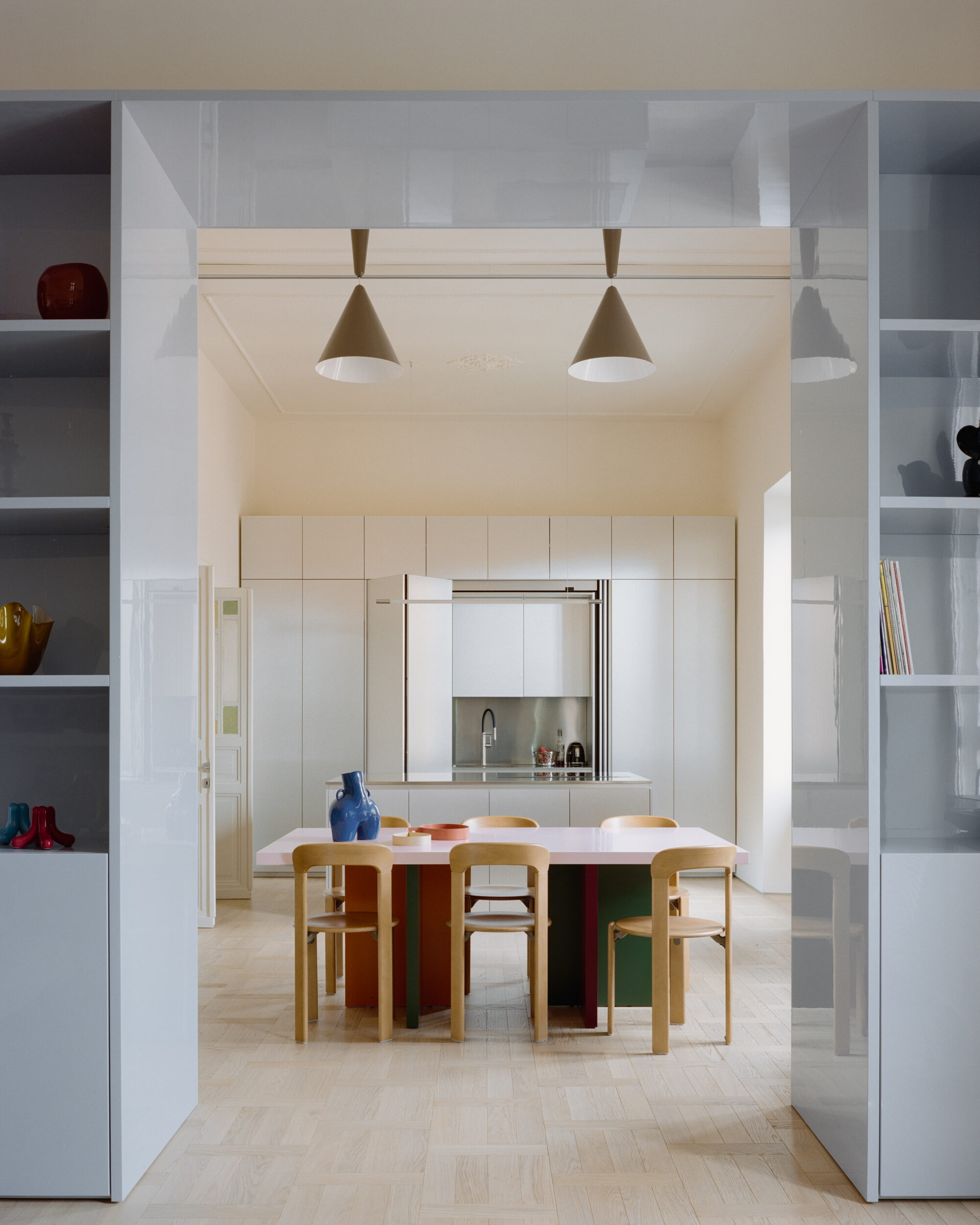 Set Architects adds reflective steel and glossy furniture to Rome apartment