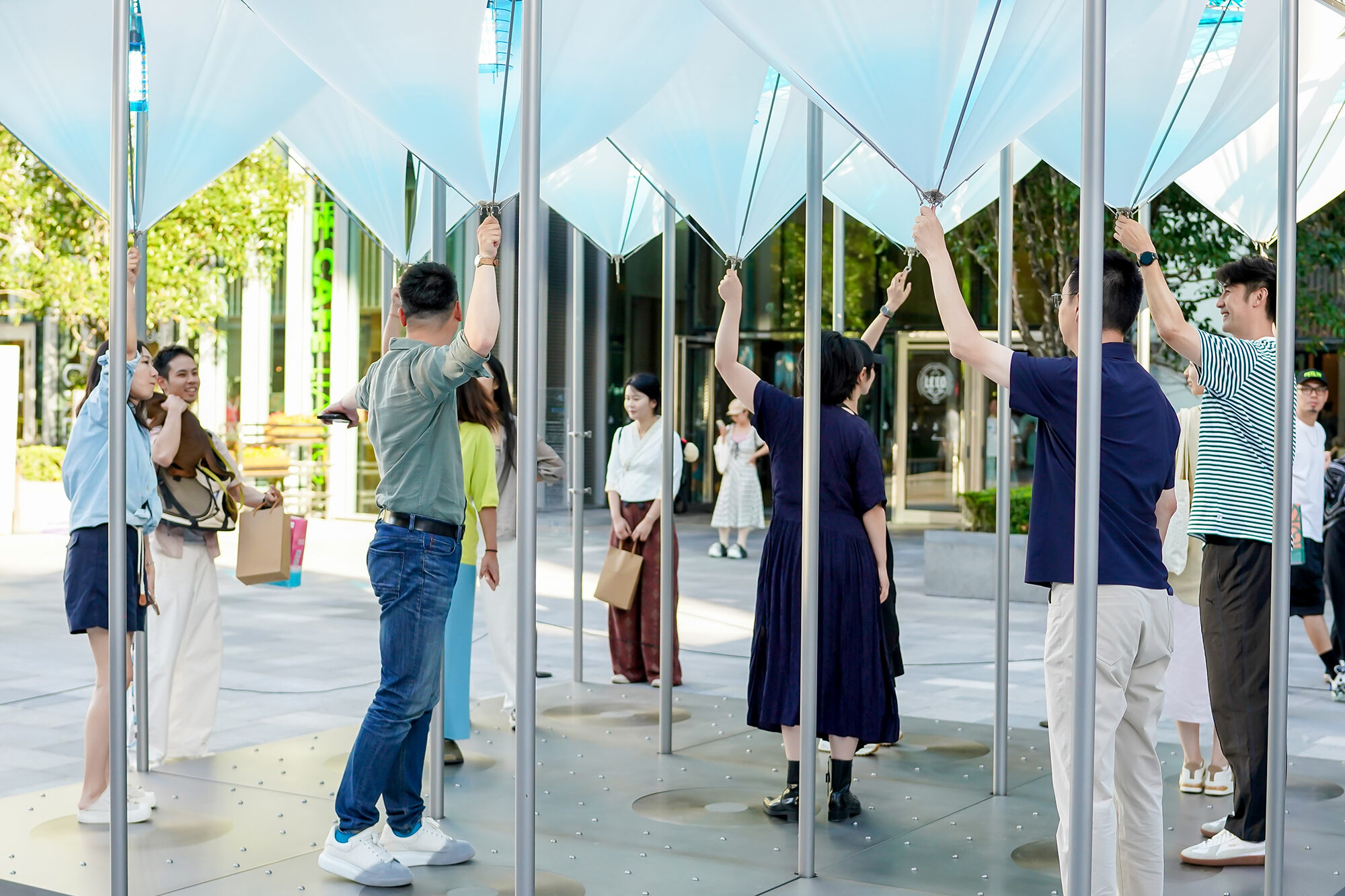 Nine suspended “glaciers” respond to visitors in Shanghai installation
