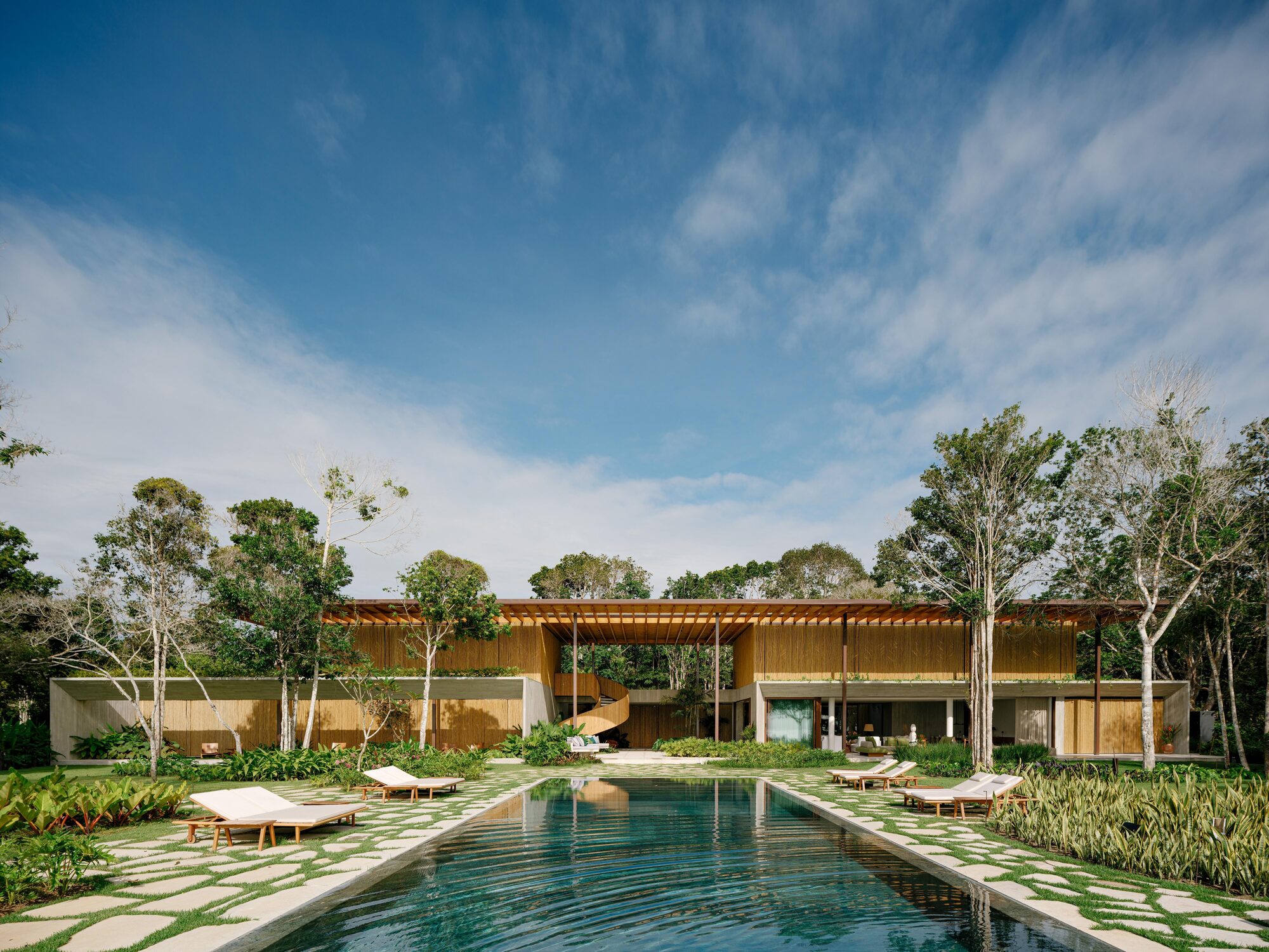 Villa Yandara turns tropical living into a horizontal composition