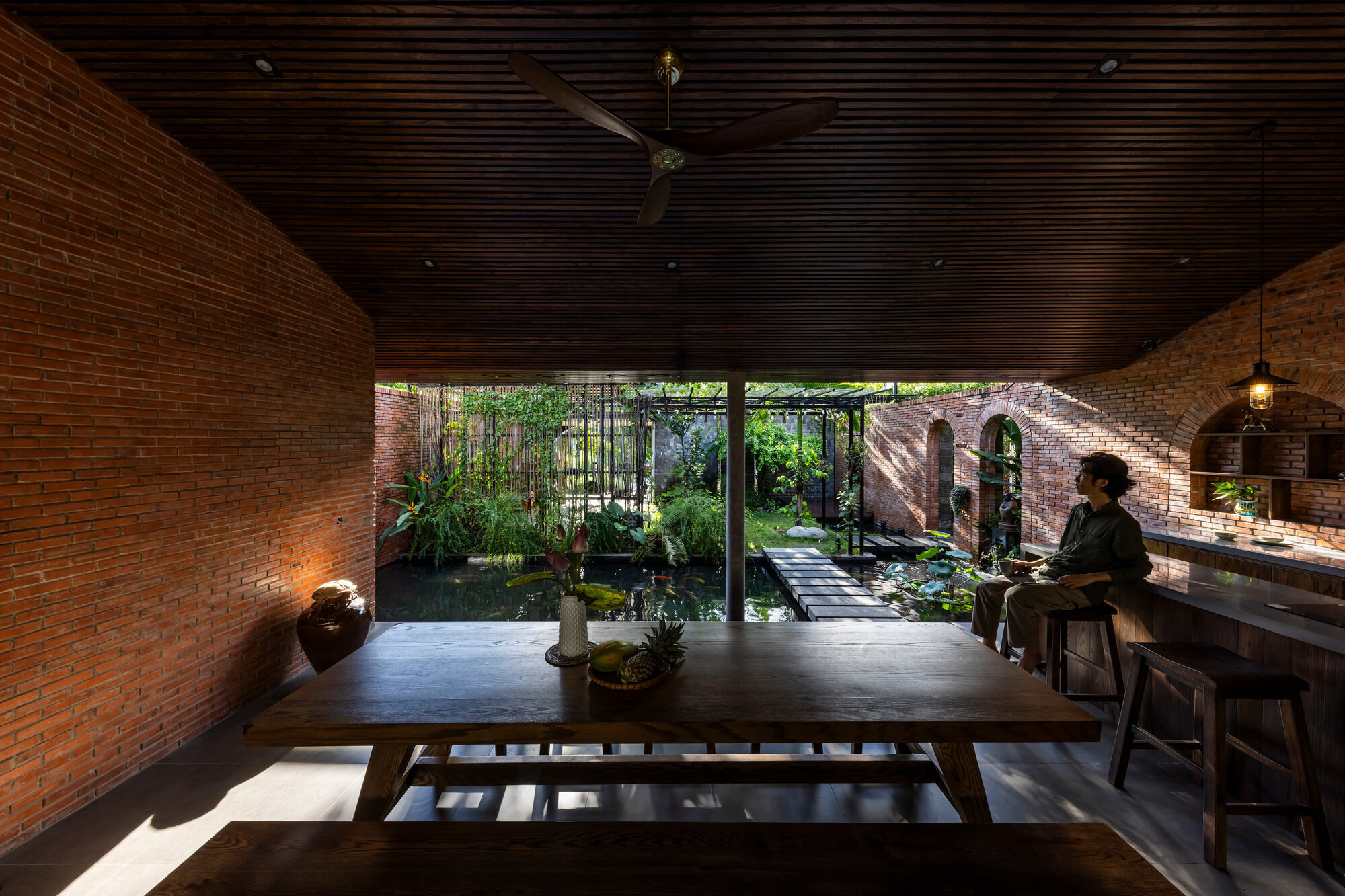 Gardens weave through doorless Mac Casa by CTA in Vietnam