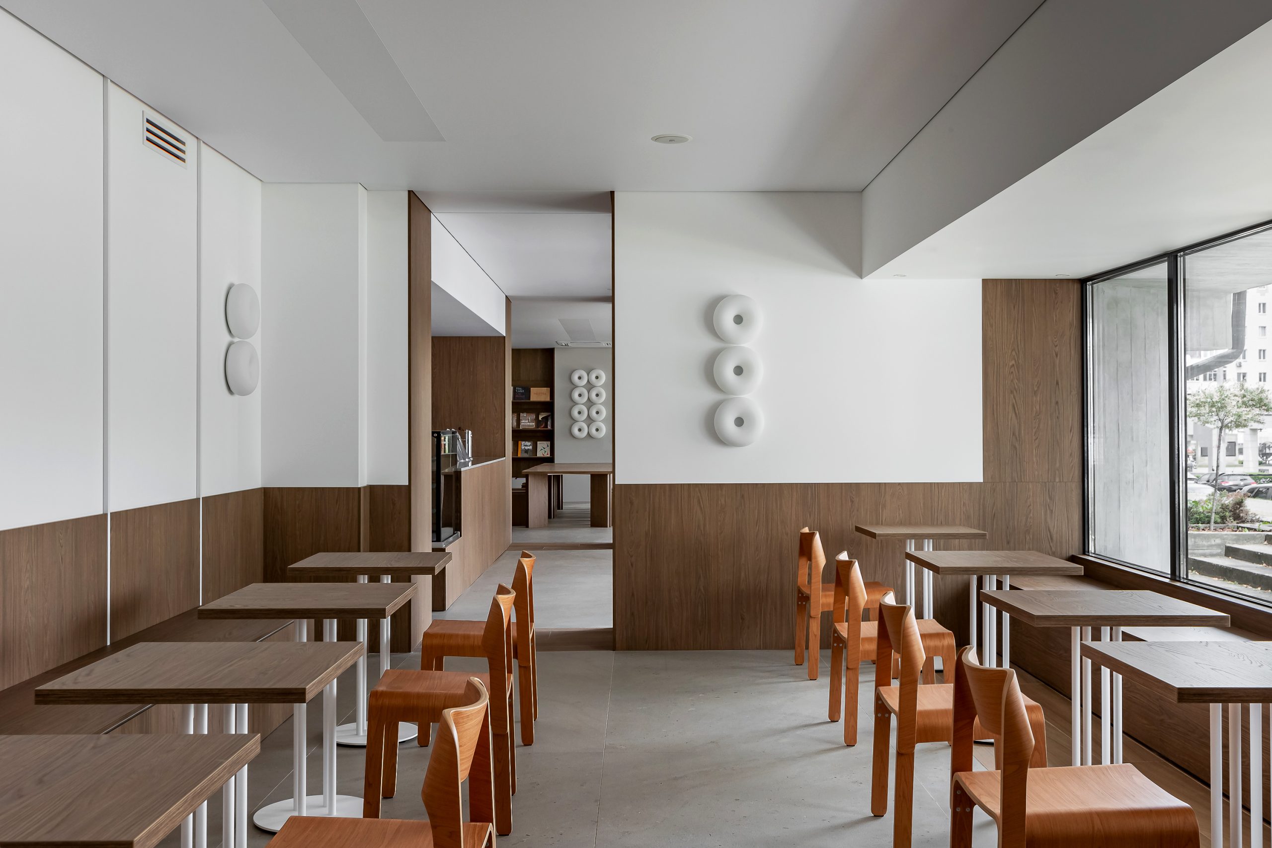 Custom furniture and warm timber finishes at MARKS Coffee & Books