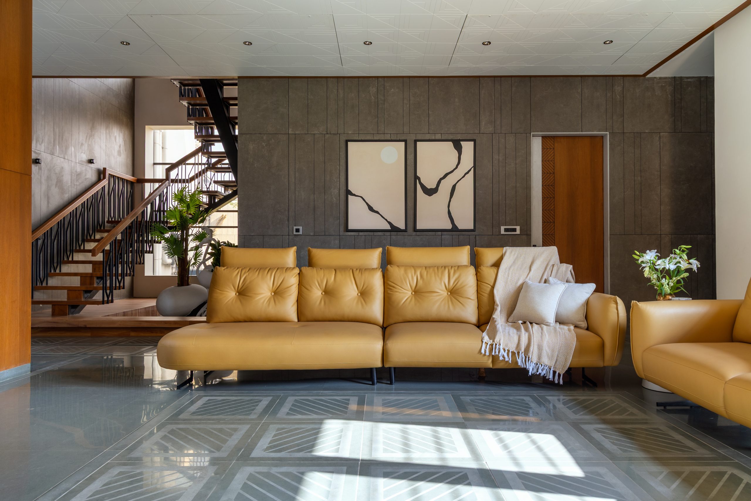 Staircase and filtered daylight at Tathasthu residence