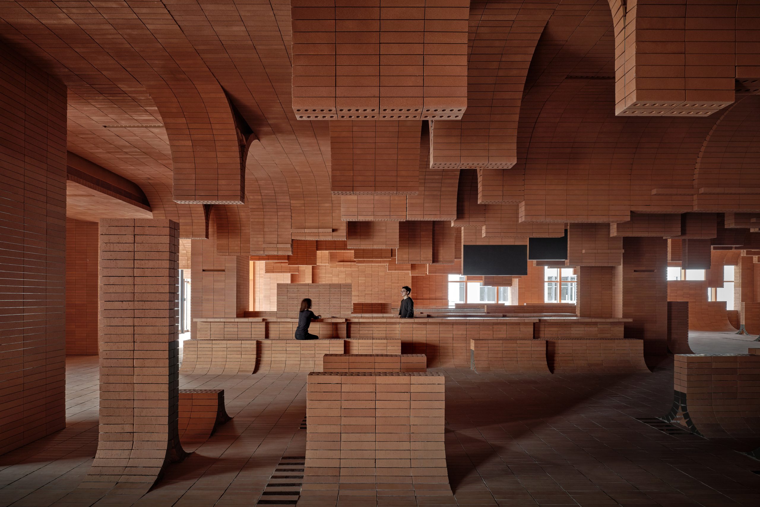 One Plus Partnership shapes Haikou cinema with wave-like brick interiors