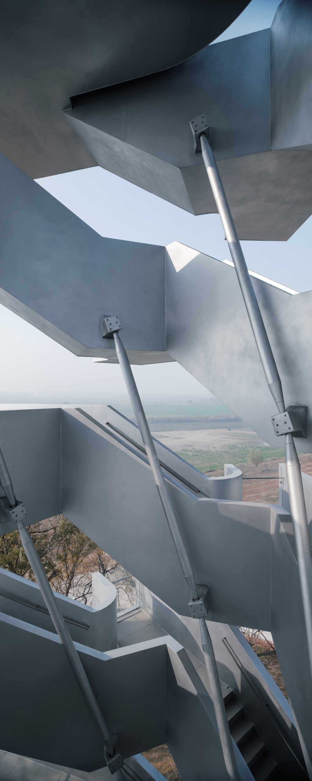 Visitors ascending Chenhu Migratory Bird Observation Tower by Xiang Architects