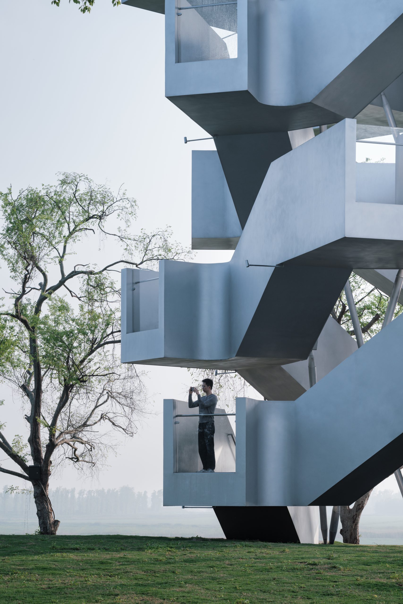 Matte silver facade of Chenhu Migratory Bird Observation Tower