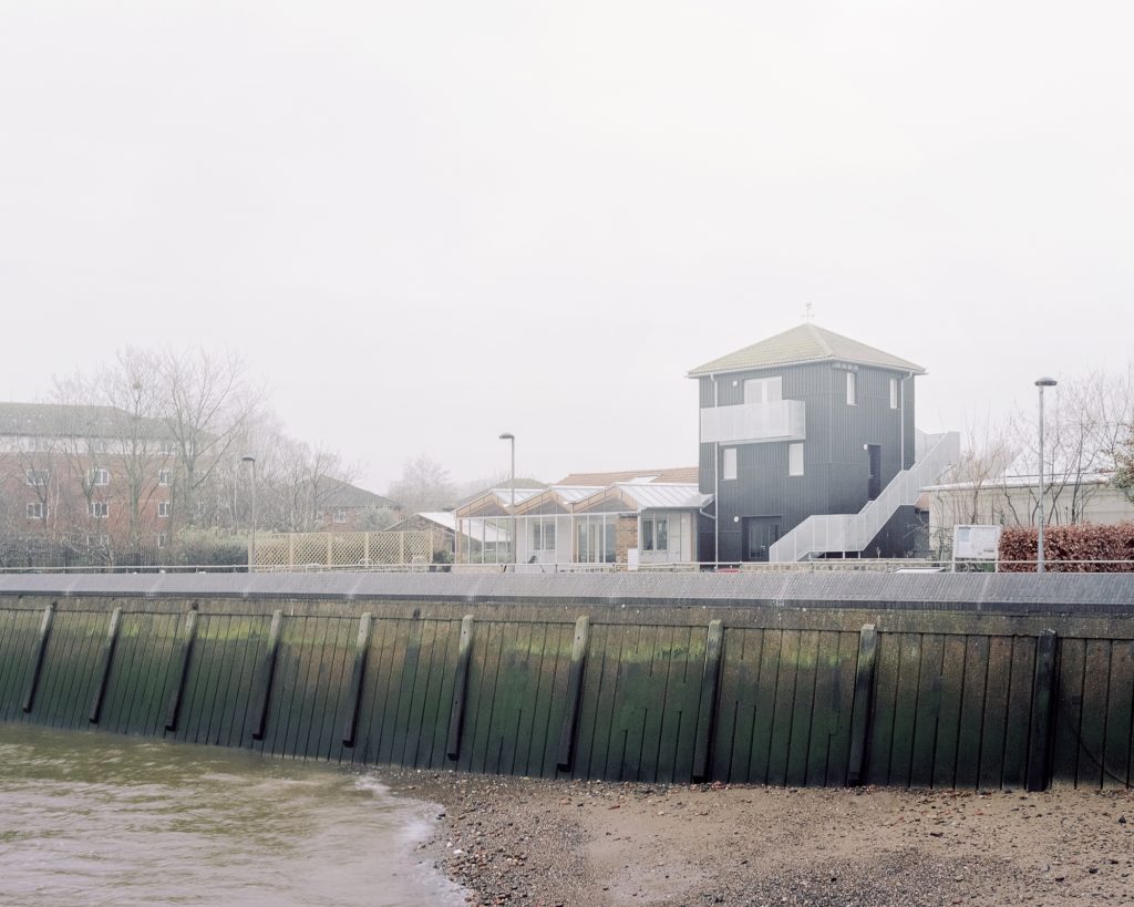 Surrey Docks Farm viewed from the Thames by Pup Architects. Photo by Simone Bossi.