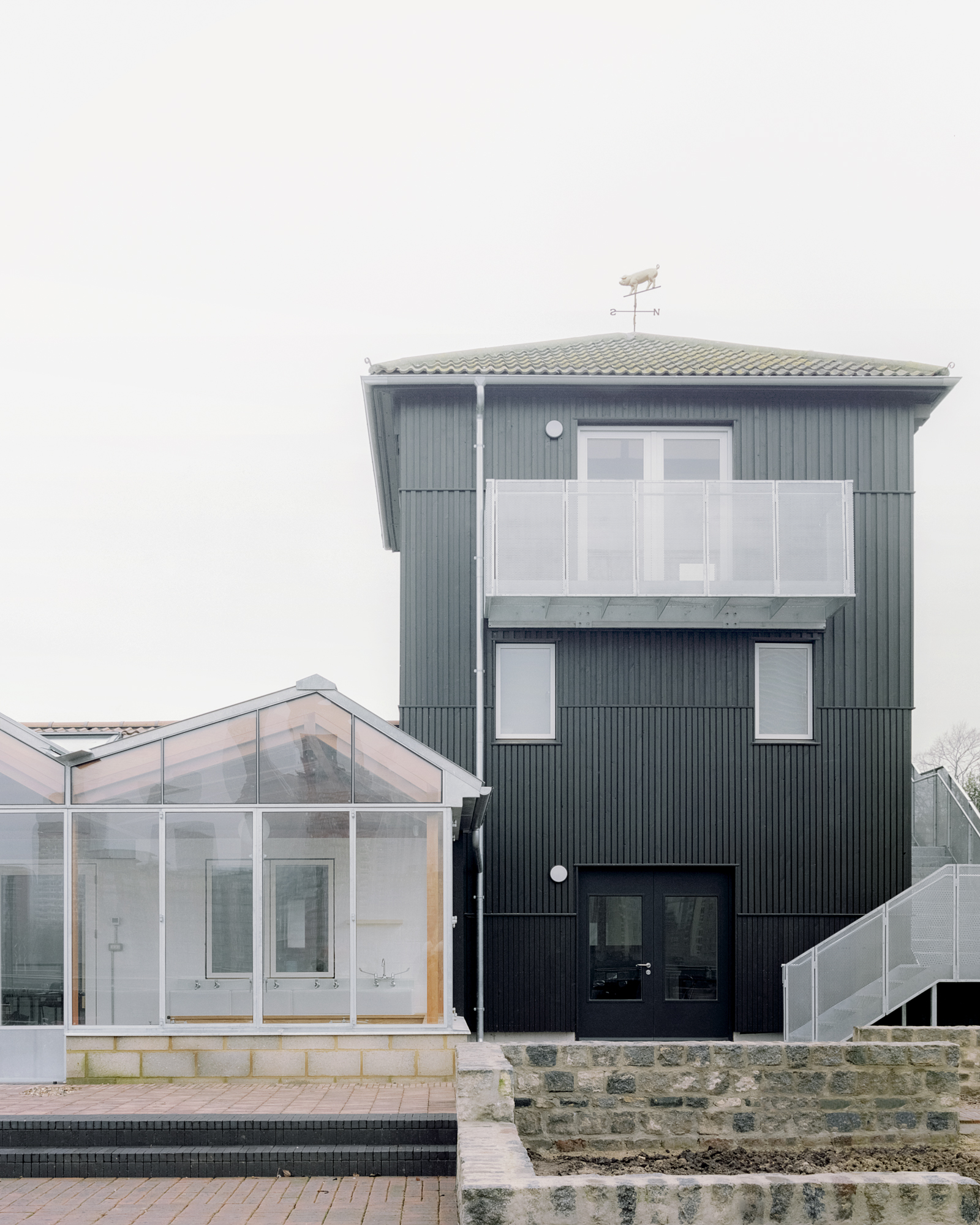 East elevation facing the Thames at Surrey Docks Farm by Pup Architects. Photo by Simone Bossi.