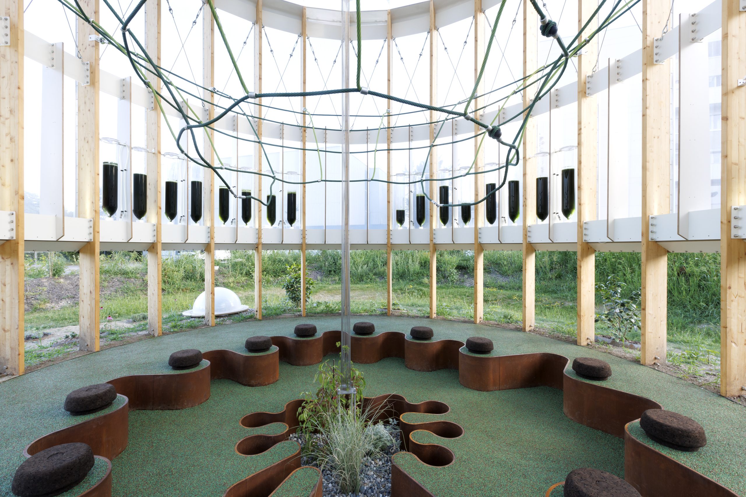 Corten and cork seating elements at AirBubble restorative space. Photo by Pepe Fotografia.