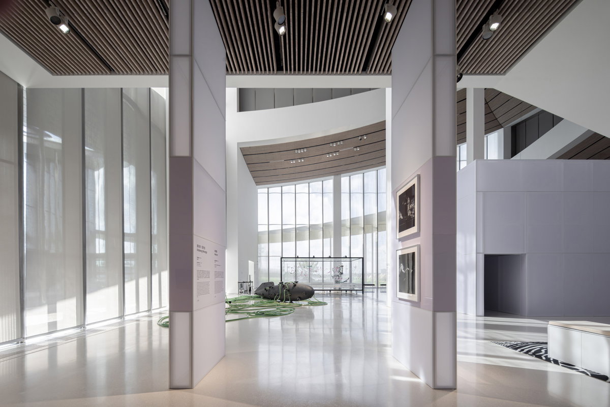 Curved museum pavilion and landscaped garden in Suzhou