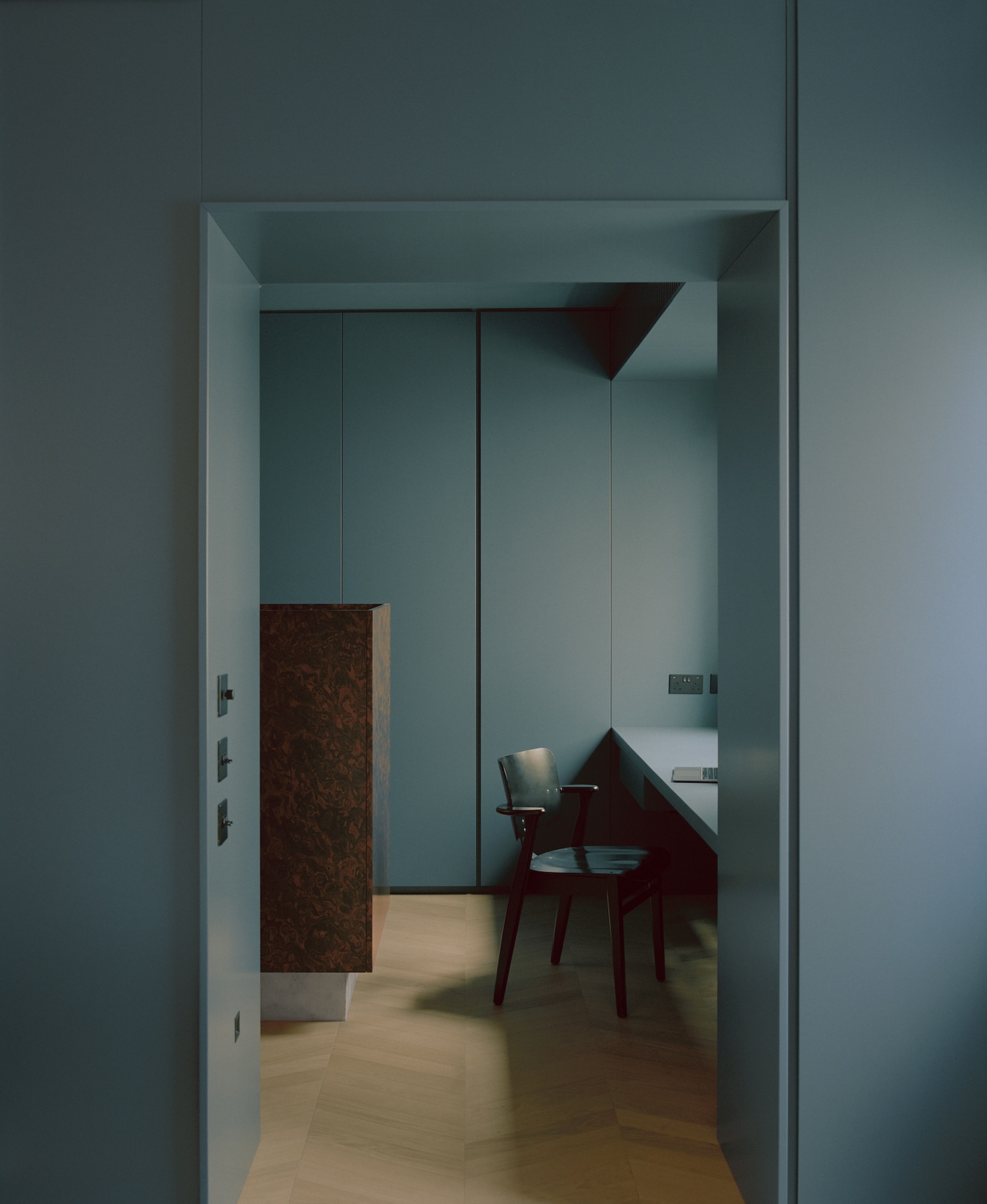 Open display shelving designed for the client’s art and objects