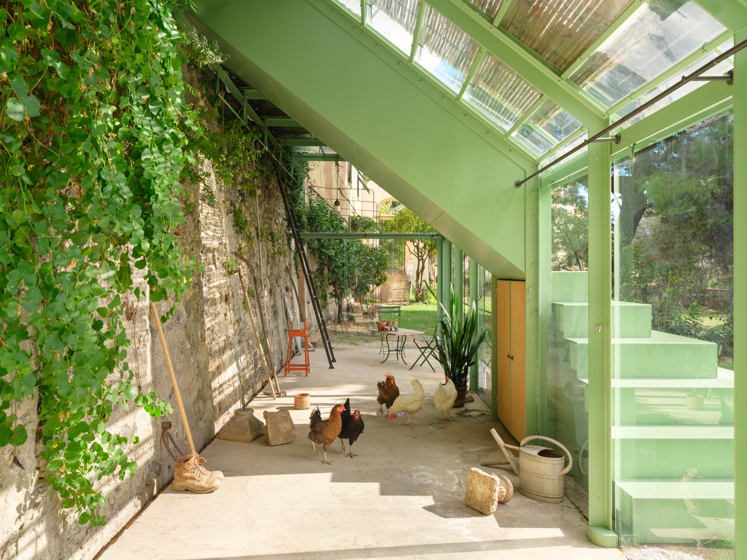 Steel stair, glazing and garden planting at Scala San Filippo