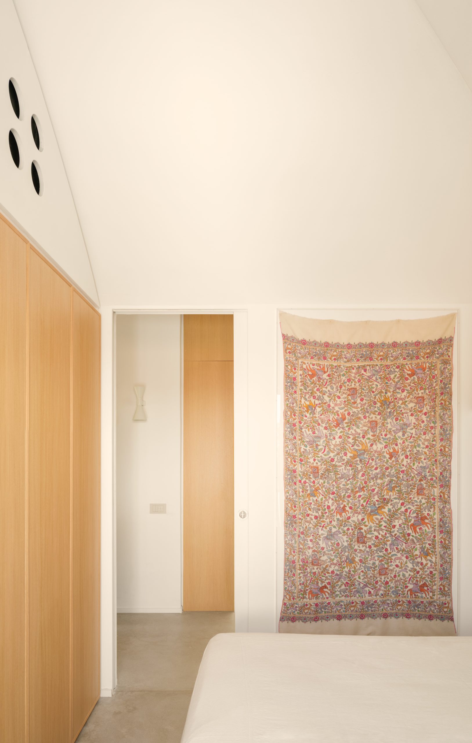 Sculptural details along the apartment entrance