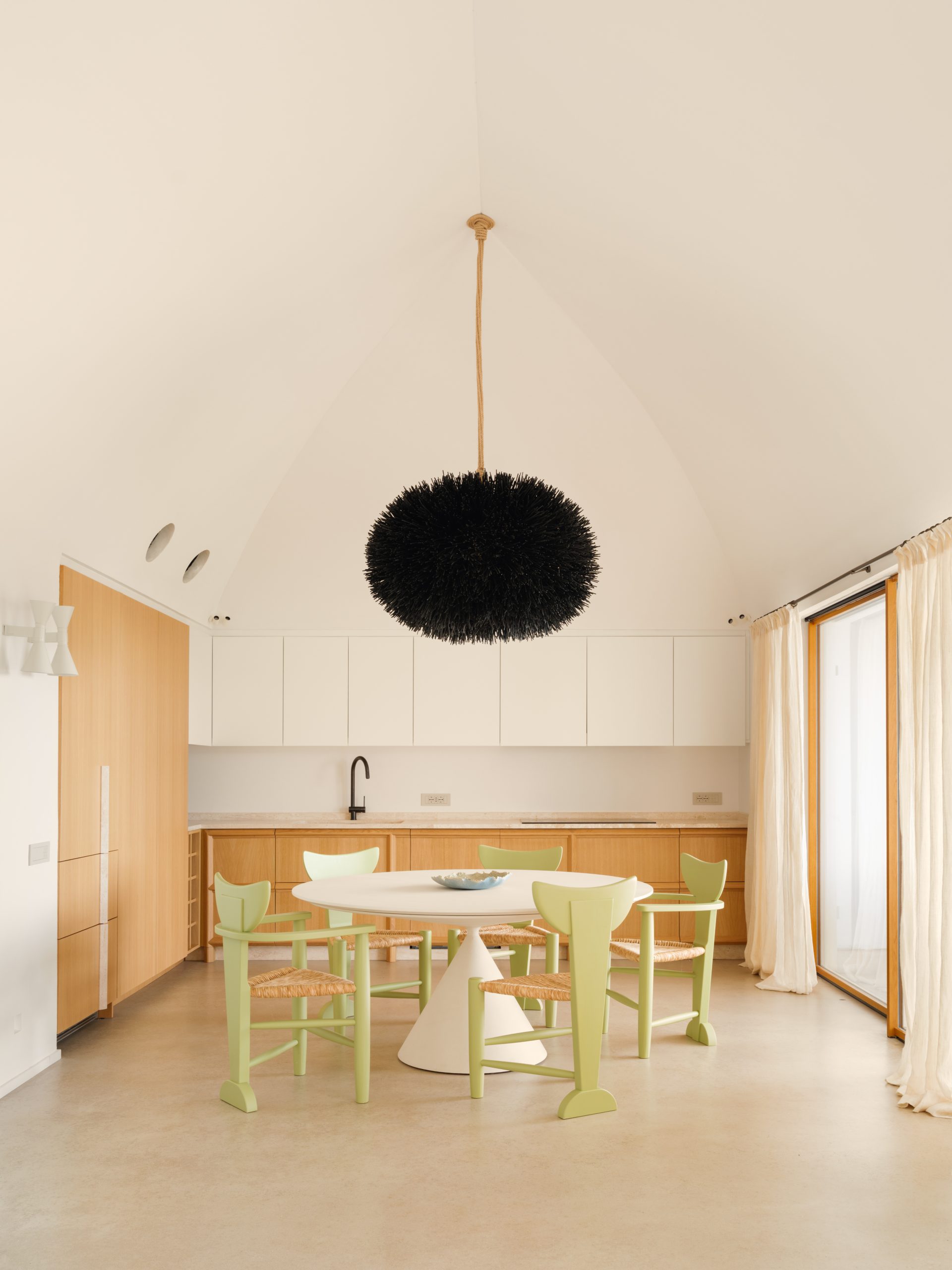 Main living area beneath the curved ceiling