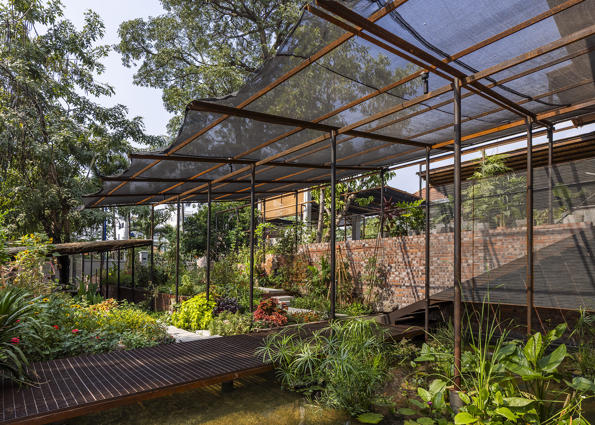 Edible farm steps beneath a lightweight layered roof