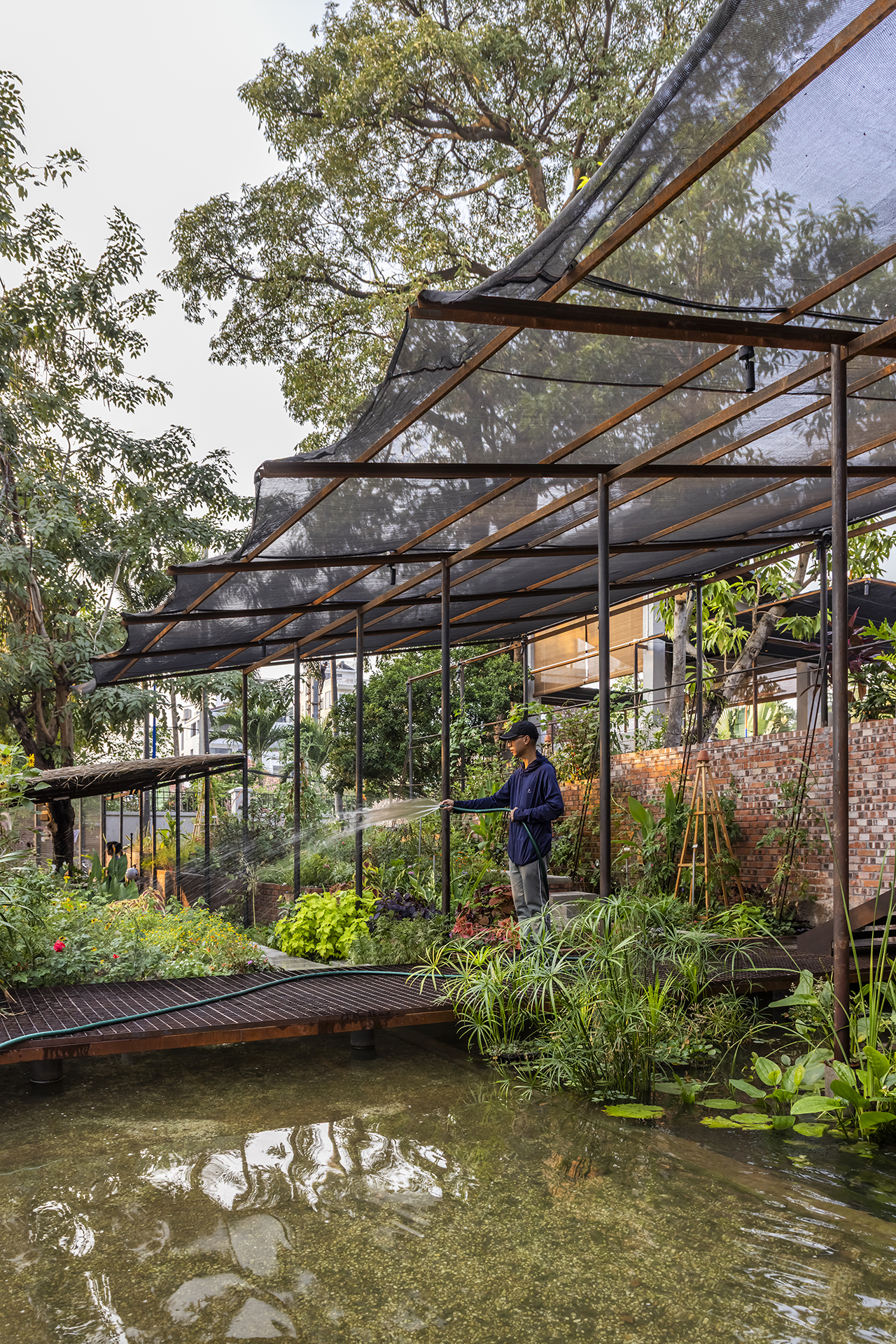 Daily watering in the restaurant’s edible farm