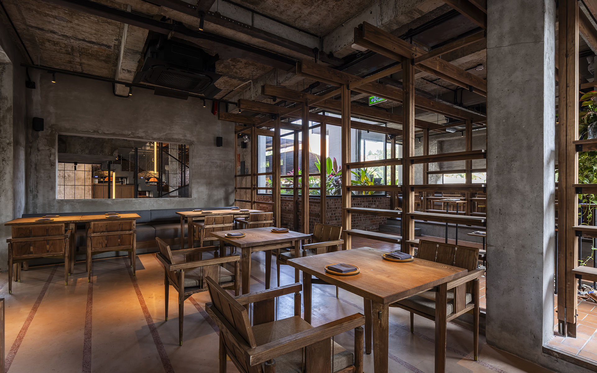 Ground-floor interior seating with exposed existing surfaces