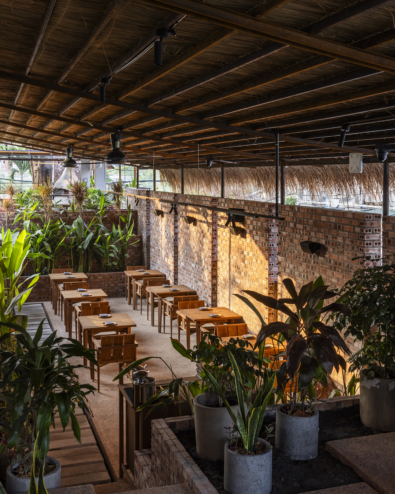 Dining seats occupy the former swimming pool