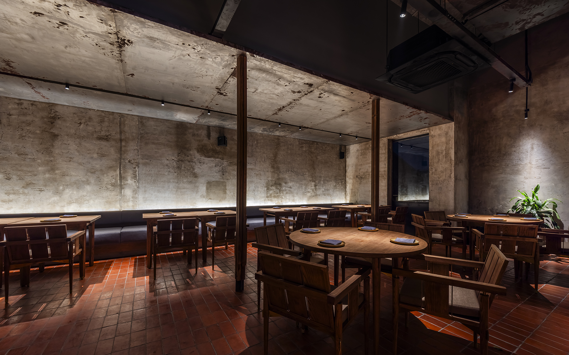 First-floor dining space illuminated at night