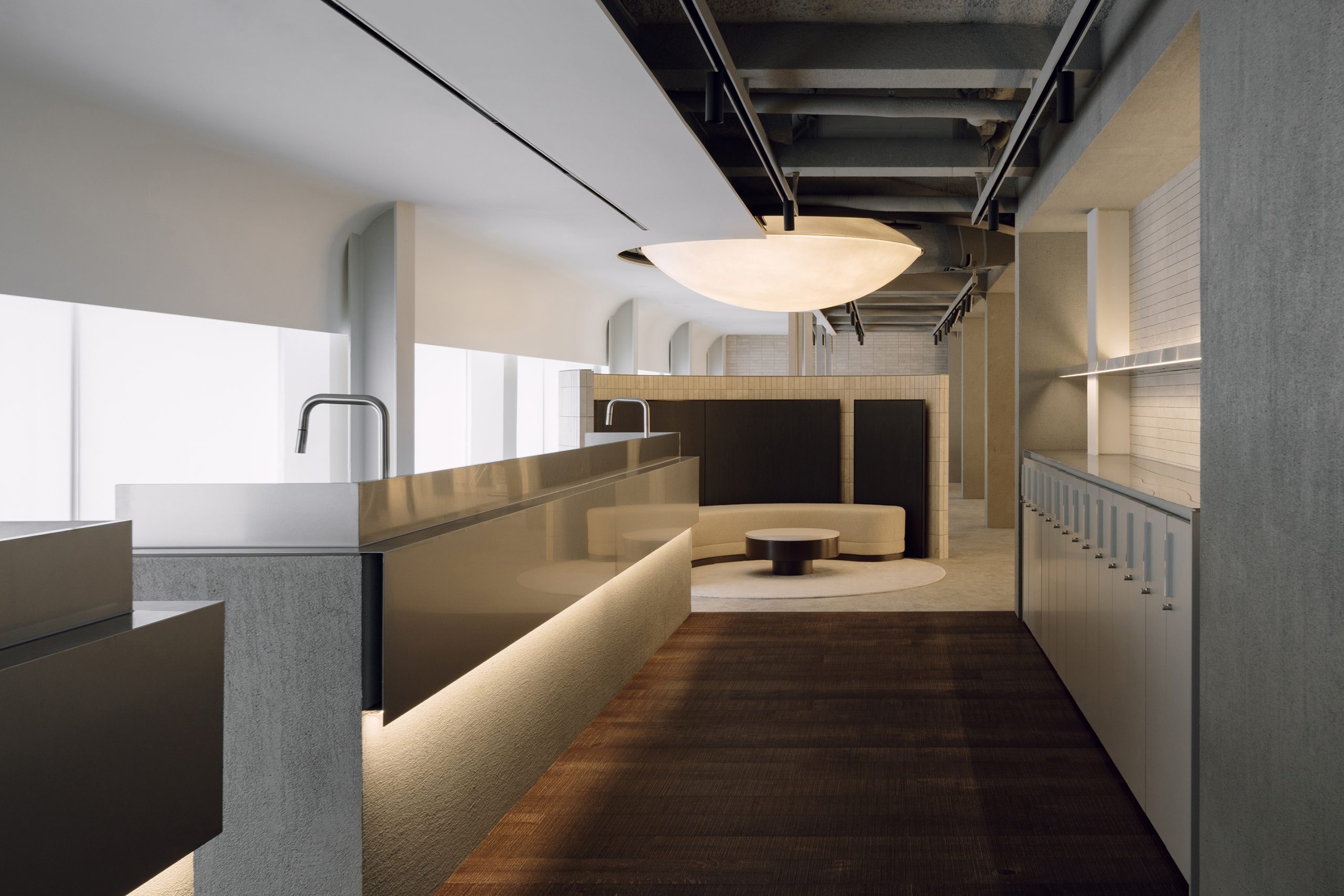 Metal counters and open ceiling inside Juno Hair Sung-su 2nd