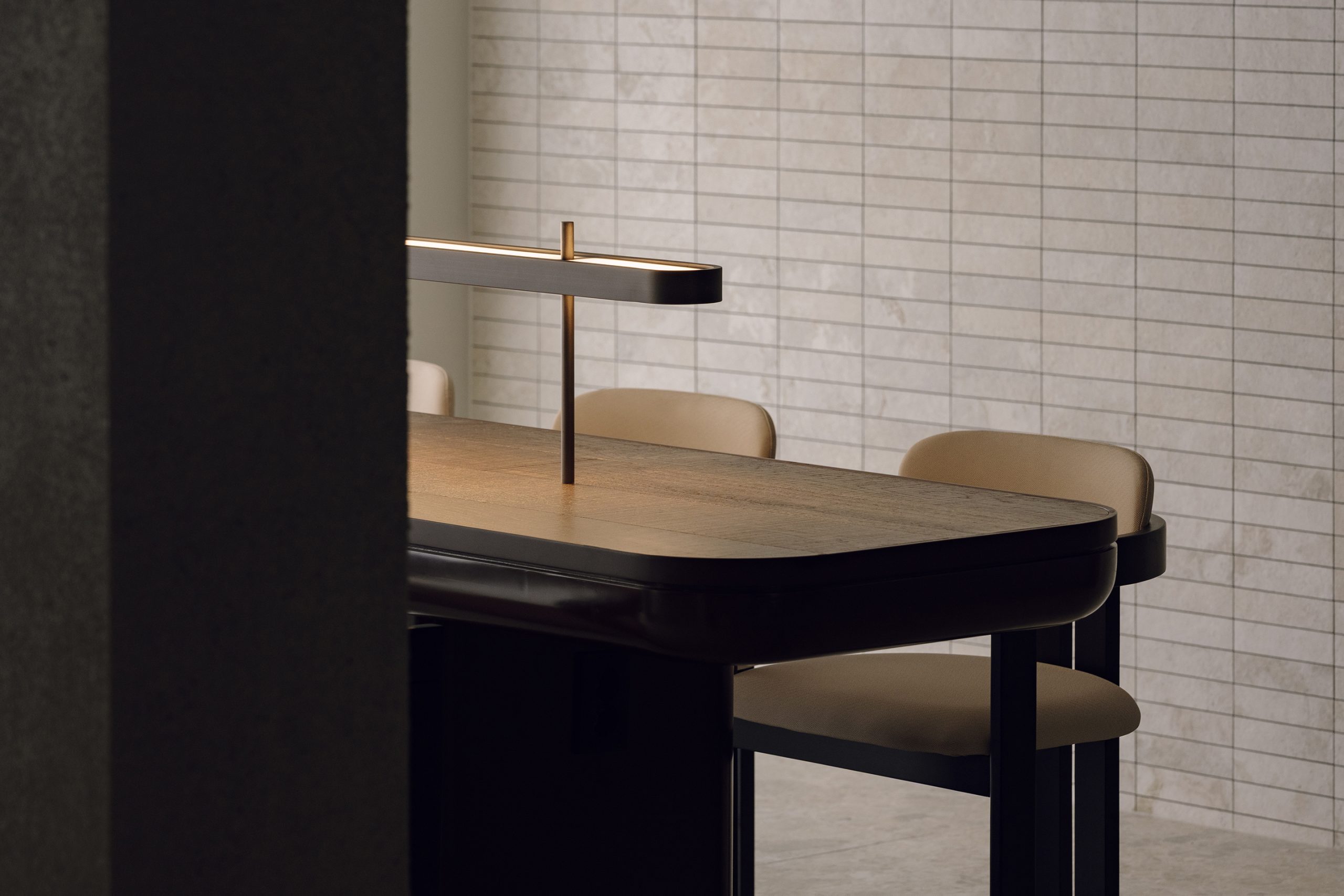 Solid-wood table against a pale textured wall